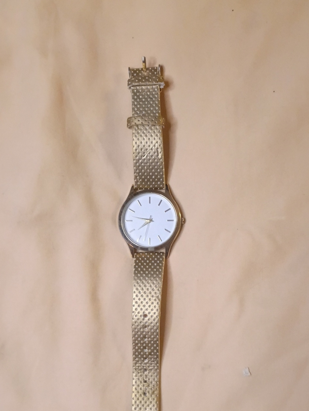 Minimalist Gold Tone Watch with Textured Strap